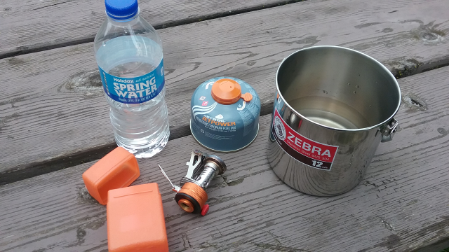 The stove and fuel canister fit into my 12cm Zebra Pot for easy storage. Takes up very little space in my backpack!